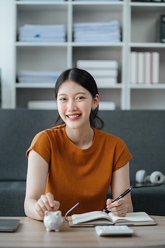 Young woman making a plan to save money for retirement